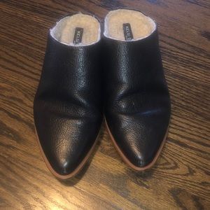 Black pointed slide on mules